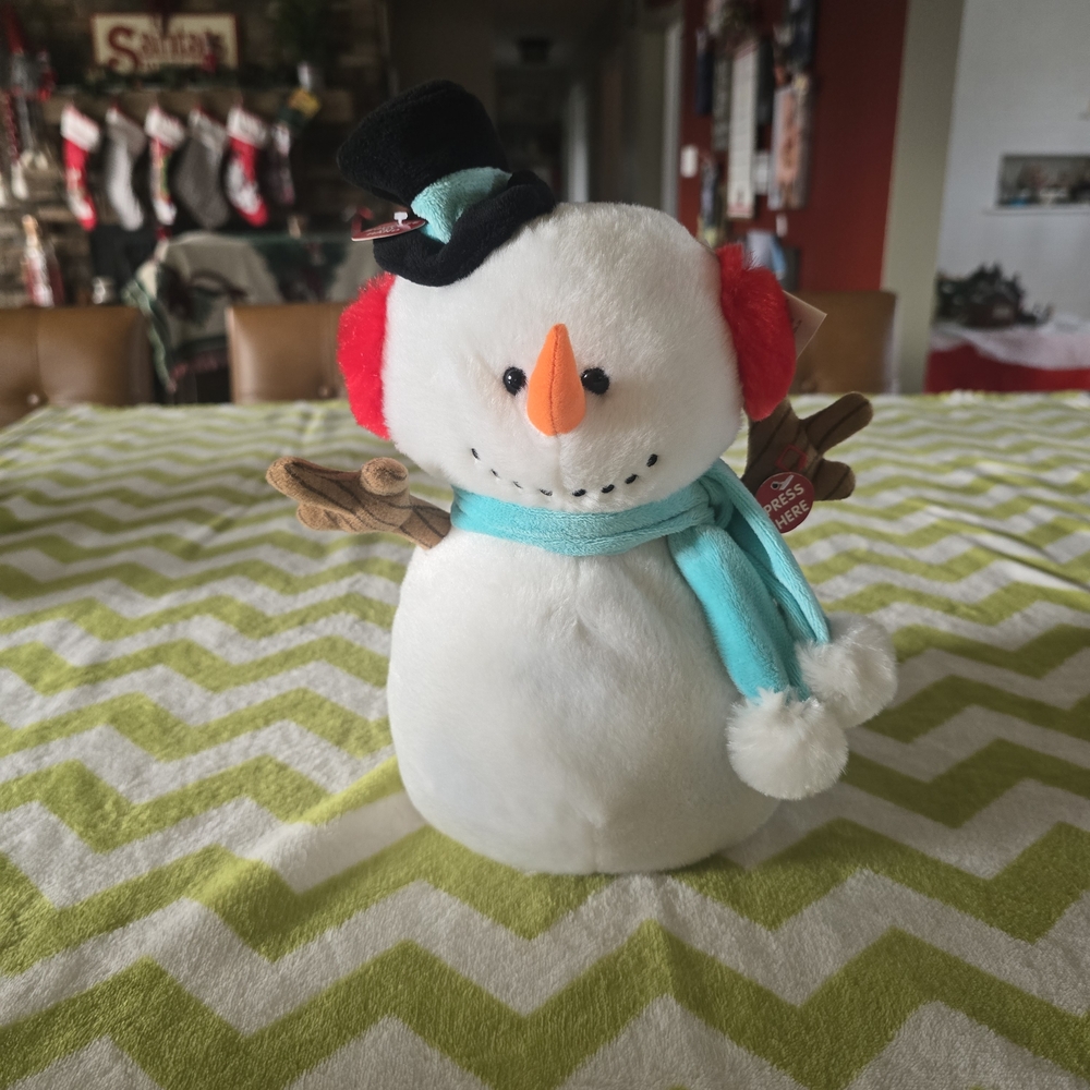 Festive Singing Snowman Plush with Red Earmuffs and Blue Scarf